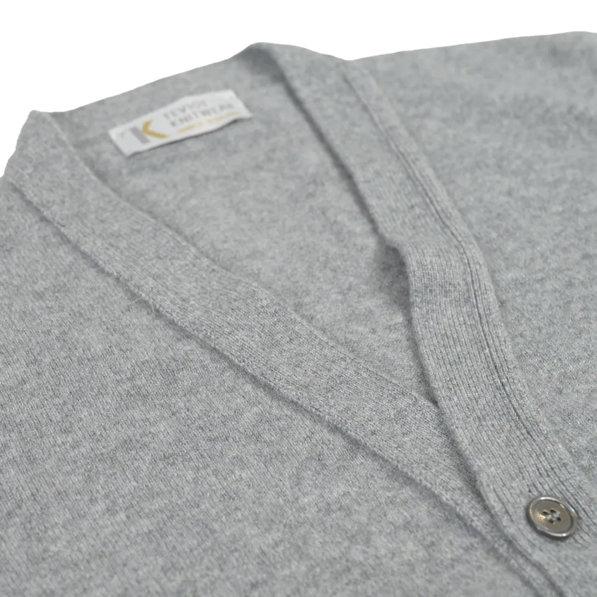 Men’s Cashmere Waistcoat in grey flannel v neck detail close up