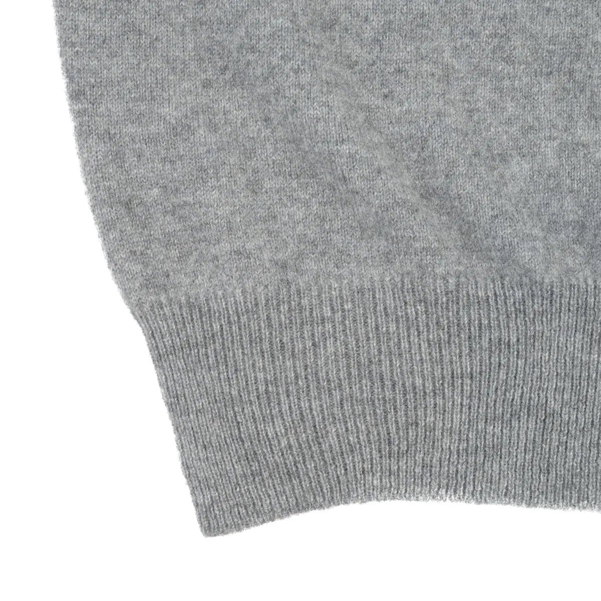 Men’s Cashmere Waistcoat in grey flannel ribbed hem close up
