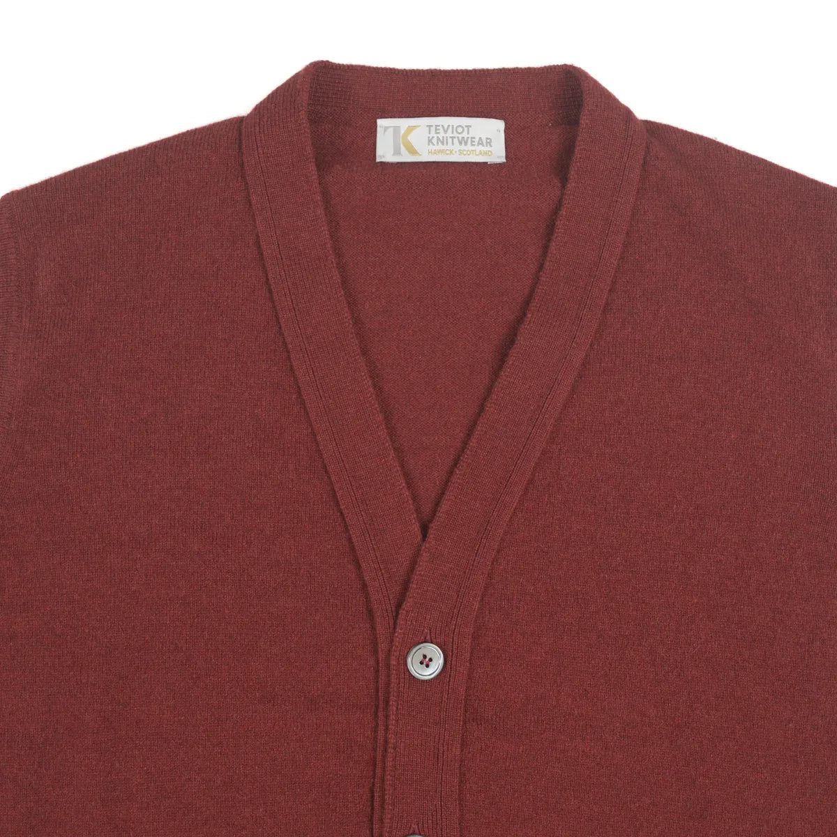 Men’s Cashmere Waistcoat in Russet red, close up of V neck detail