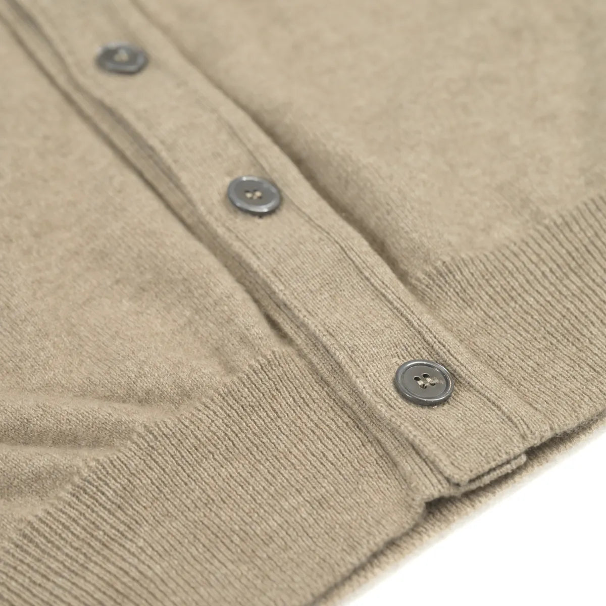 Men’s Cashmere Waistcoat Dark natural hem and button detail close up