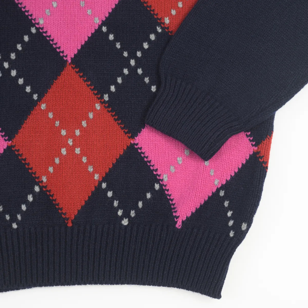 Hem detail Women’s Chunky Argyle Jumper, colour Nero Navy with Punk Pink, Ruby Red and Flannel Grey Raker